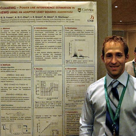 Photo of Graham Fraser presenting a research poster